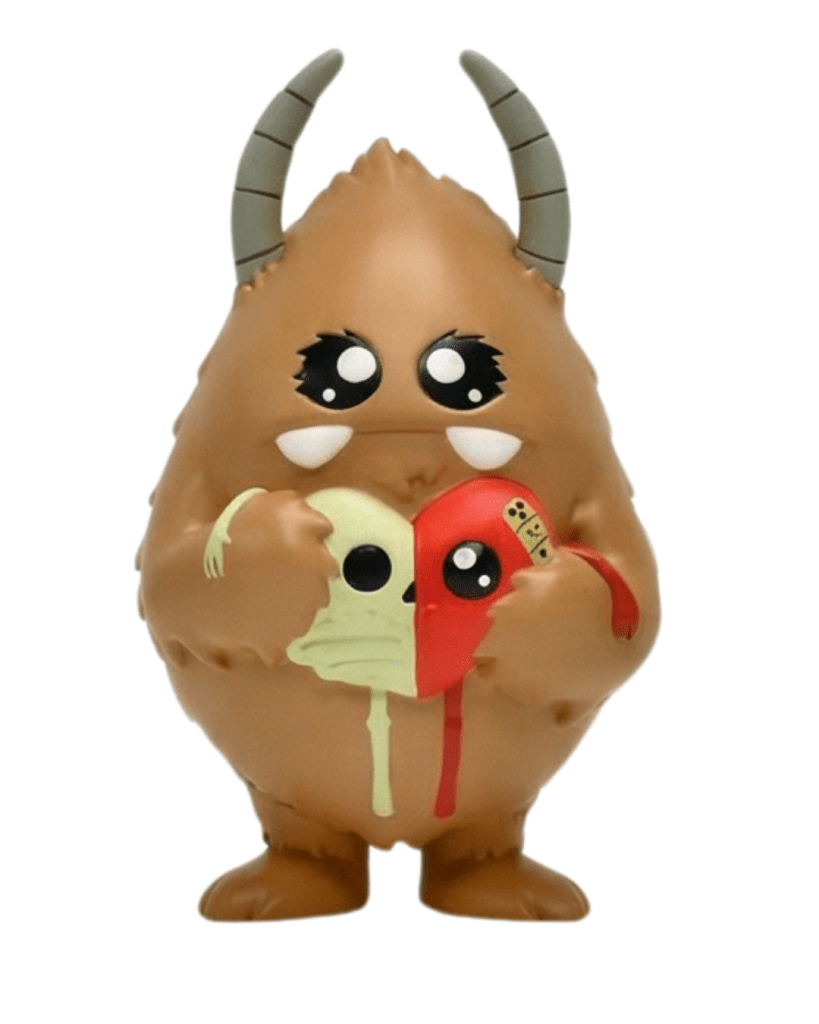 The original brown colorway of the Yerman soft vinyl figure holding a split red and green Skele-Heart.